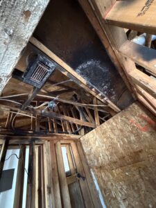 Ceiling wiring and framing during apartment fire-damage reconstruction